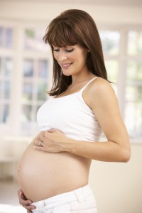 Pregnant woman at home
